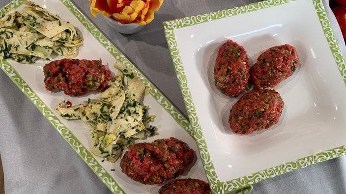 Tatar und Artischockensalat