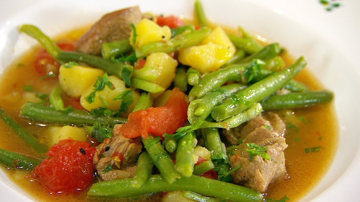 Eintopf mit Lamm, grünen Bohnen, Kartoffeln und Tomaten
